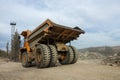 Large mining dump truck. Transport industry. Extraction of stone in an open pit