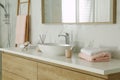 Large mirror over vessel sink in bathroom interior Royalty Free Stock Photo