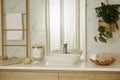 Large mirror and vessel sink in bathroom Royalty Free Stock Photo