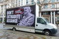 Large mobile protest poster at the Free Julian Assange demonstration.