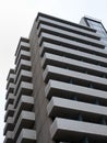 Large modern apartment block with external balconies Royalty Free Stock Photo