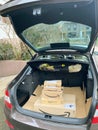 Large modern car trunk with multiple Amazon prime cardboards