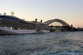 Cruise Ship in Circular Quay, and Sydney Harbour Bridge, at Dusk, Australia Royalty Free Stock Photo