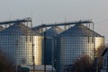 A large modern plant for the storage and processing of grain crops. view of the granary on a sunny day. Large iron