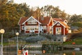 Large and modern red and white cabin by the sea Royalty Free Stock Photo