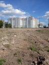 Large modern residential building built in a new area on a vacant lot