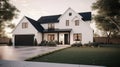 Large modern two-storey country house in European Scandinavian style with white siding walls and black roof. Neatly Royalty Free Stock Photo