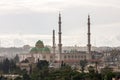 Mosque with minarets and green domes in centre of Aleppo Syria before the war