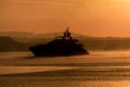 Large Motor Cruiser Silhouetted in Mist, Plymouth Sound, South Devon