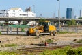 The large motor graders parked in the constrcution site