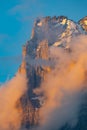Large mountain covered in snow and clouds Royalty Free Stock Photo