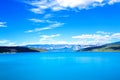 A large mountain lake and mountains.