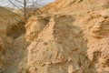 Large mountains of yellow sand.