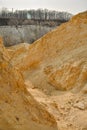 Large mountains of yellow sand.