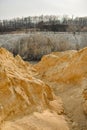 Large mountains of yellow sand.