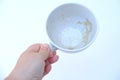 Large mug with drips of coffee on walls in woman`s hand, drunk coffee, divination or fortune-telling method that interprets