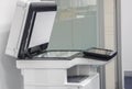 Large multi functional printer standing in office for use in copying, scanning Royalty Free Stock Photo