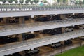 Large multi-level parking for cars in rainy weather