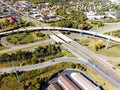 large multi-level road junction in the city of Leesburg, Virginia. View from a drone on a sunny day