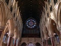 A large multicolored stained glass window in the Roman Catholic Church of the city of Cobh. The interior of Cathedral Church of St Royalty Free Stock Photo