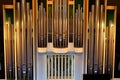 Large musical organ with organ pipes in Christian church. Musical instrument, Church service, concert