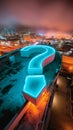 A large, glowing neon question mark on a rooftop at night with city lights in the background Royalty Free Stock Photo