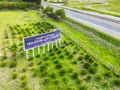 Large new home development sign seen in a field adjacent to a Cambridgeshire dual carriage way. Royalty Free Stock Photo