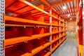 Large newly build warehouse with steel shelves