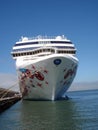 Large Norwegian Cruise Line Cruise ship docked on pier Royalty Free Stock Photo