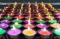 A large number of candles showing the faithful power of worshipers