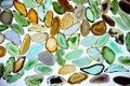 Large number of colored agates, faceted stones Royalty Free Stock Photo