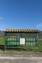 A large number of mailboxes with roof