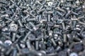 Large number of metal, steel bolts. Close-up. Macro. Background and texture Royalty Free Stock Photo