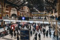 Large number of people during rush hour inside  Liverpool Street station, London, UK Royalty Free Stock Photo