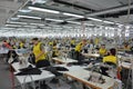 Production hall with workers in a textile industrial company Royalty Free Stock Photo