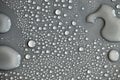 Large number of water drops. Abstract background texture. Waterfalls on a solid background, collecting bubbles on a clean surface Royalty Free Stock Photo