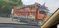 Large numbers of devotees are travelling in a multi layer trucks for reaching their religious place in India