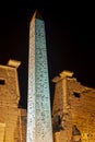 Large obelisk at entrance to Luxor Temple during night Royalty Free Stock Photo