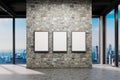 large office with centered grey stone tile wall and white canvas in modern frame copy space in front of panoramic window skyline