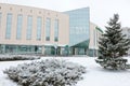 large office of Sberbank located in a building of glass and concrete after a snowfall