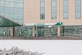 large office of Sberbank located in a building of glass and concrete after a snowfall