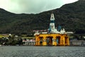 Oil rig drilling platform in Norway behind the mountains Royalty Free Stock Photo