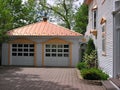 Large old house with garages in small town, Canada