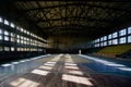 Large old ruined gymnasium in abandoned school