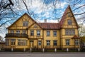 Large old wooden yellow building