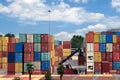 A large open-air warehouse for shipping containers in a seaport Royalty Free Stock Photo