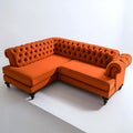 Large orange couch with a curved back and a long seat Royalty Free Stock Photo