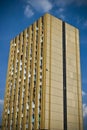 Large orange old block of flats or apartment in the city Royalty Free Stock Photo