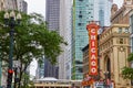 Large orange sign with Chicago in white lettering in downtown of city, historic building Royalty Free Stock Photo