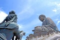 Outdoor bronze statue of seated Tian Tan Buddha in Hong Kong Royalty Free Stock Photo